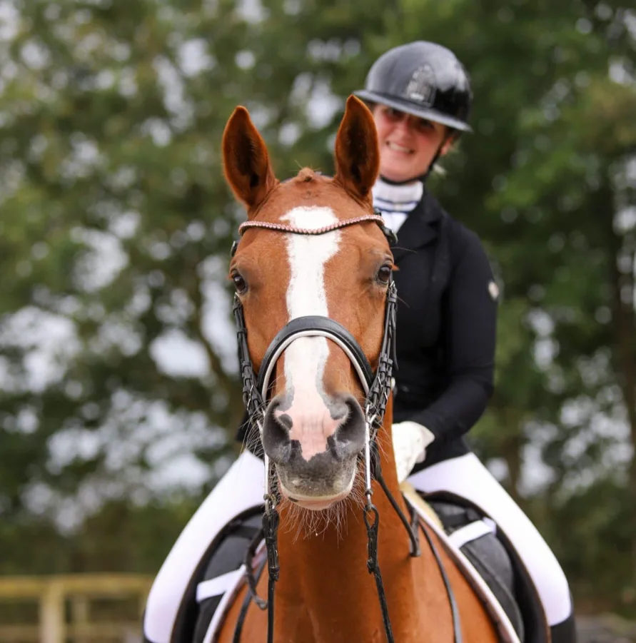 Bonny Becks riding a chestnut horse